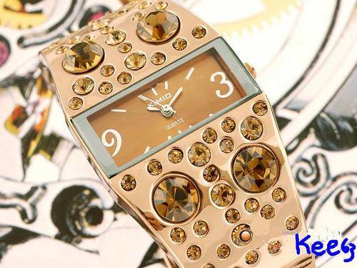 STUNNING LADIES RIHNSTONE BRACLET TYPE WATCH